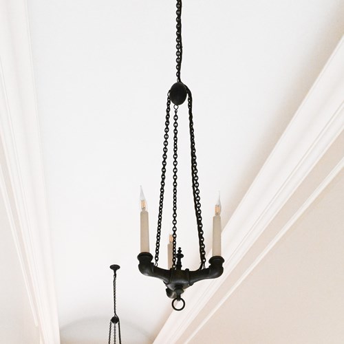 Pair Of Patinated Bronze Three-Light Chandeliers In The Empire Taste
