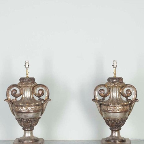 Pair of Large Carved and Silvered Wooden Urns Converted to Table Lamps