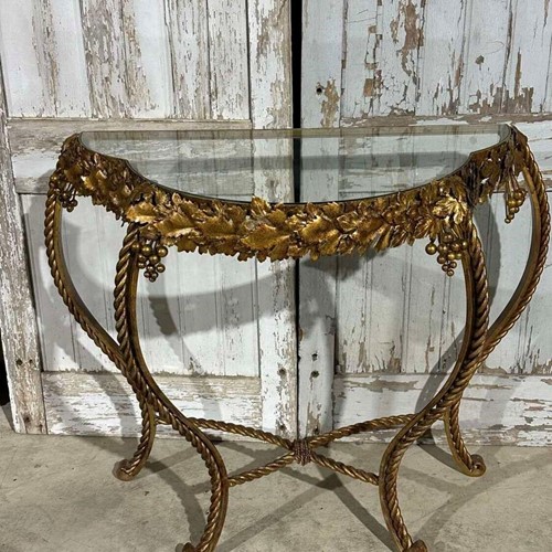 Mid century gilt metal and glass console table circa 1960