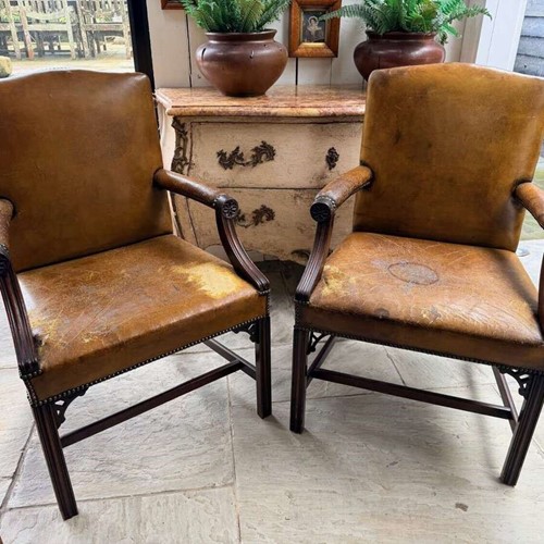 Pair of leather Gainsborough chairs UK 1880
