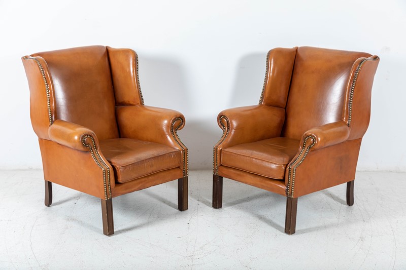 Tan Leather Wingback Armchairs-adam-lloyd-interiors-pair-tan-leather-wingback-armchairs-main-637733845548791031.jpg