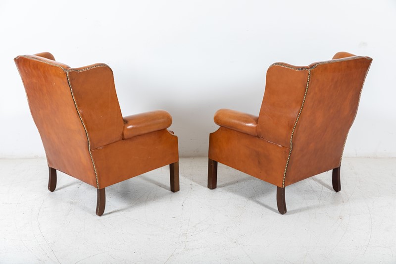 Tan Leather Wingback Armchairs-adam-lloyd-interiors-pair-tan-leather-wingback-armchairs3-main-637733845800507843.jpg
