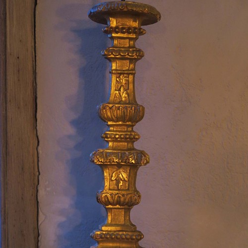 Tall carved gilt wood candle stick, c1780, Italy
