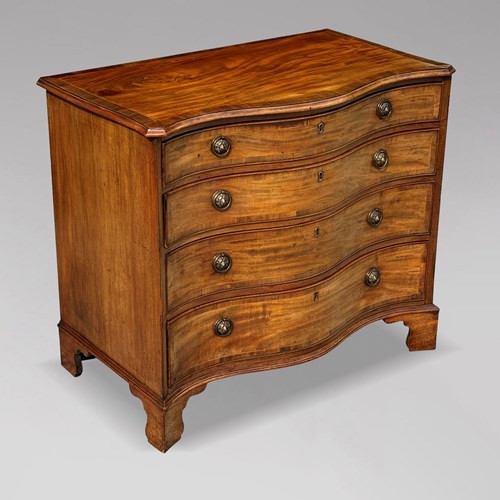 George III Period Serpentine Chest Of Drawers