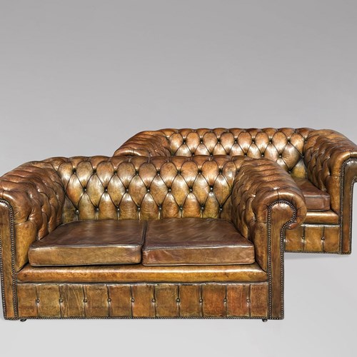 Pair Of Green Leather Chesterfields