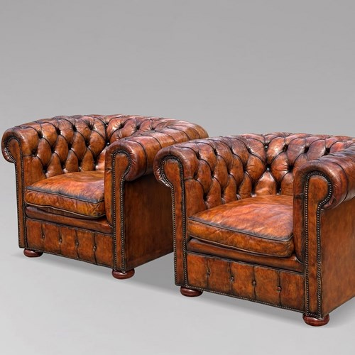 Pair Of Brown Leather Chesterfield Club Armchairs