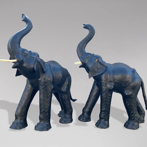 Pair Of Tall Leather Elephants