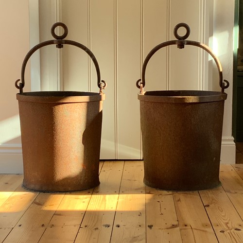 Large pair of antique cast iron buckets