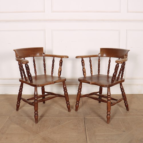 Pair Of English Smokers Bow Arm Chairs