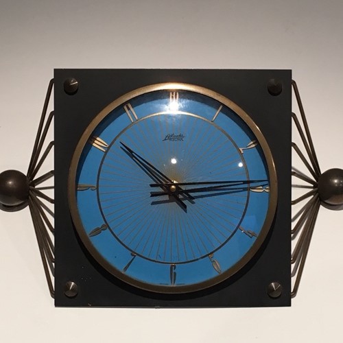 Lacquered Metal, Glass and Brass Clock