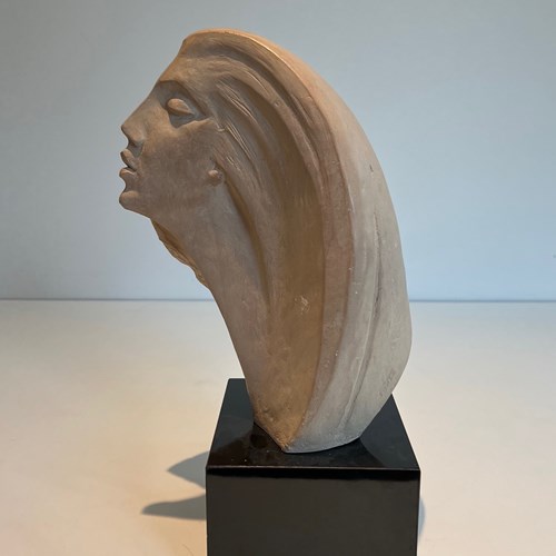 Terracotta Sculpture Representing A Woman's Face.