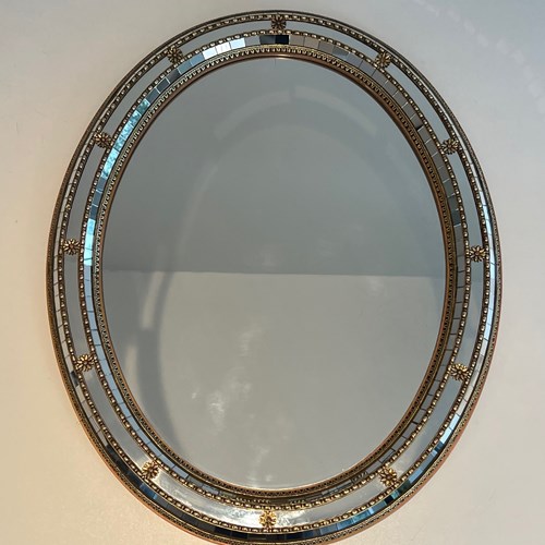 Multi-Facets Round Mirror With Brass Garlands. French Work. 