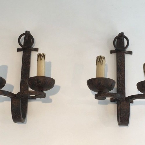 Pair Of Wrought Iron Wall Sconces. French Work. Circa 1950