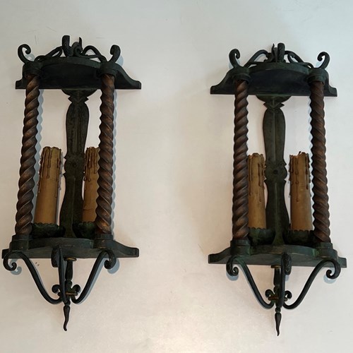 Pair Of Wrought Iron Wall Lanterns Patinated In A Green Color 