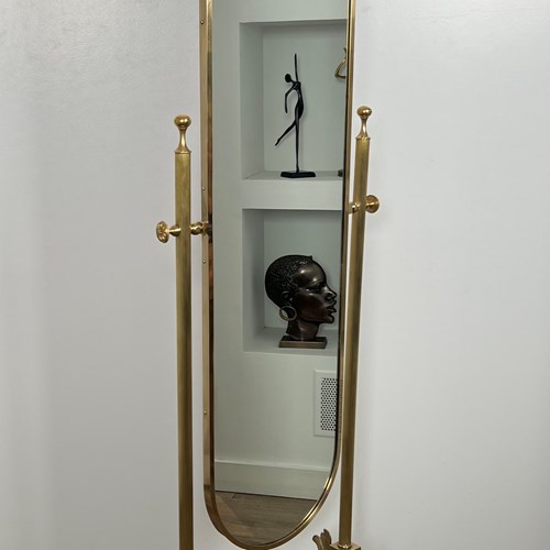 Neoclassical Style Swinging Brass Psyche Mirror With Dolphins Base. 