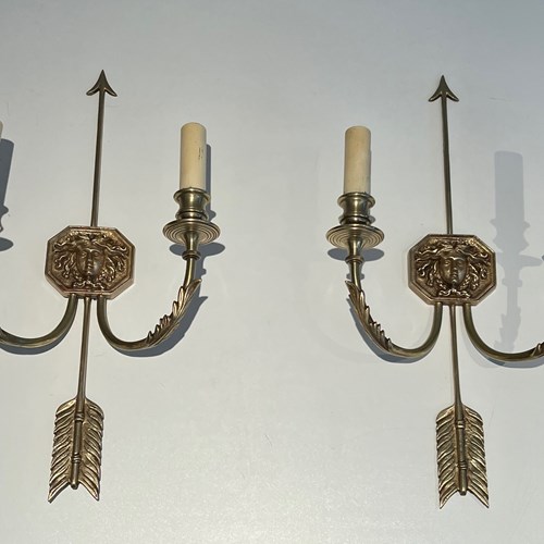 Pair Of Bronze Wall Sconces Presenting A Bronze Arrow