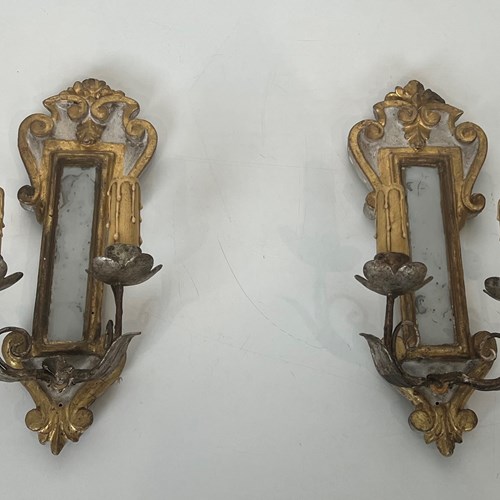 Pair Of Patinated, Silvered And Gilt Carved Wood Wall Lights 