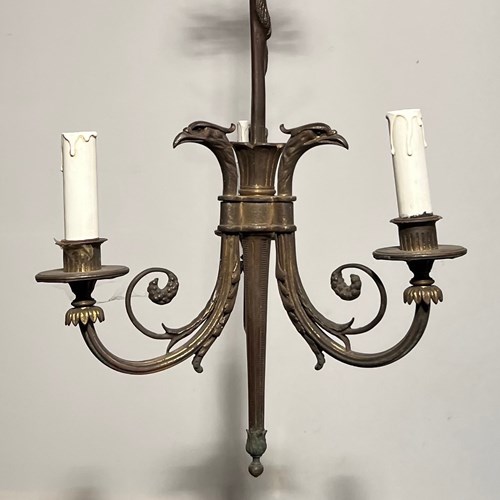 Empire Style Bronze Chandelier With 3 Lights Topped With Eagles Heads.