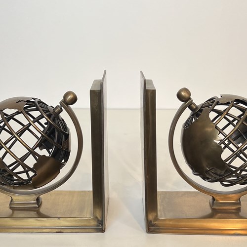 Pair Of Brass Bookends Featuring Openwork Terrestrial Globes. French Work. Circa