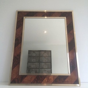 Wooden marquetry and brass mirror. Circa 1960 