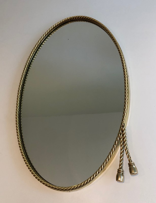  In the style of Maison Bagués. Oval Brass Mirror -barrois-antiques-50s-39841-main-637445039620703359.jpg