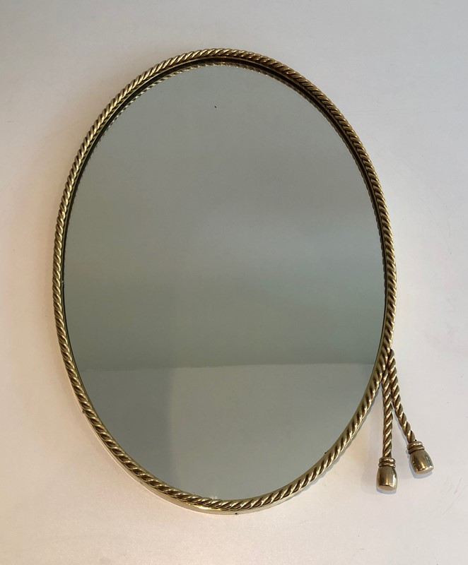  In the style of Maison Bagués. Oval Brass Mirror -barrois-antiques-50s-39842-main-637445040338981492.jpg