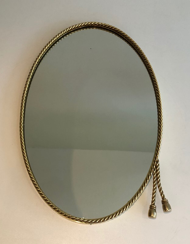  In the style of Maison Bagués. Oval Brass Mirror -barrois-antiques-50s-39849-main-637445040477104561.jpg