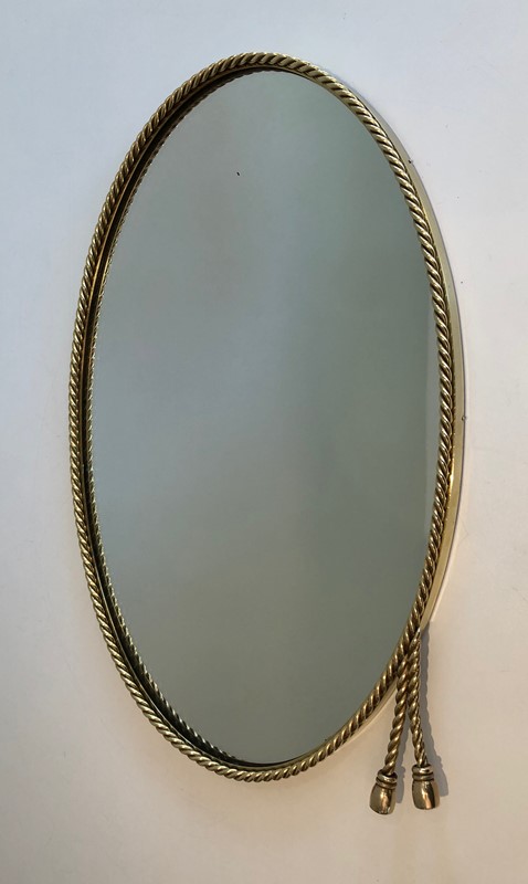  In the style of Maison Bagués. Oval Brass Mirror -barrois-antiques-50s-39852-main-637445040791950249.jpg