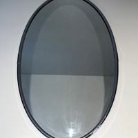Chromed oval mirror in the Art Deco style. French