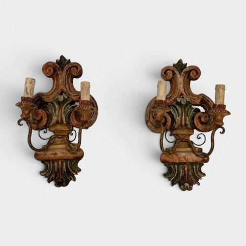 Pair Of Wall Lights In Polychrome Carved Wood With A Vase And Acanthus. Iron Arm