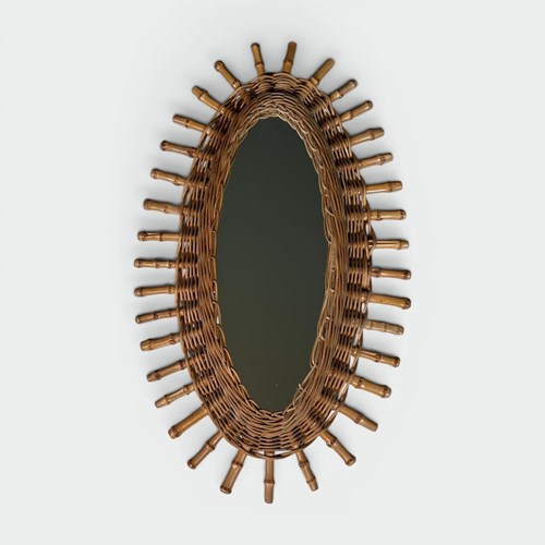 Oval Mirror In Rattan. Woven Wicker And Bamboo. French Work. Circa 1960