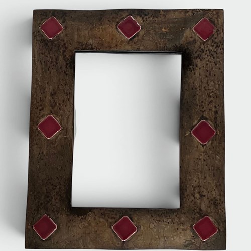 Mirror With Bronze Enamelled Ceramic Frame With Red Lozenge Cabochons. In The St