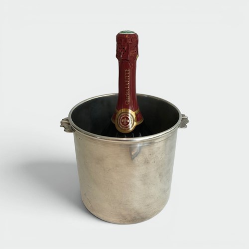 Cylindrical Silvered Metal Champagne Bucket With Small Foliate Handles. Circa 19