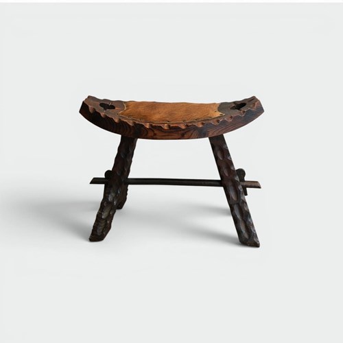 Brutalist Stool In Carved Wood With Hide Seat. Spanish Work. Circa 1950