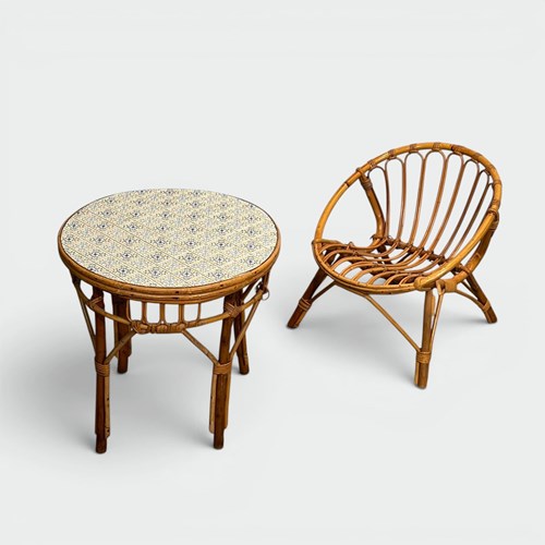 Set Of A Child's Table And Chair In Rattan. Ceramic Tile Top. French Work. Circa