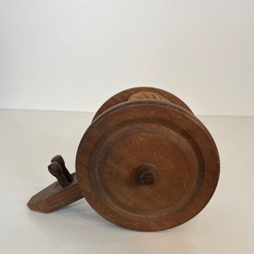 Wood And Rope Bottle Holder Representing A Cannon