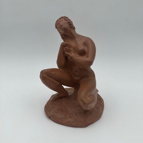 Statue Depicting A Crouching Female Nude In An Intimate And Contemplative Postur