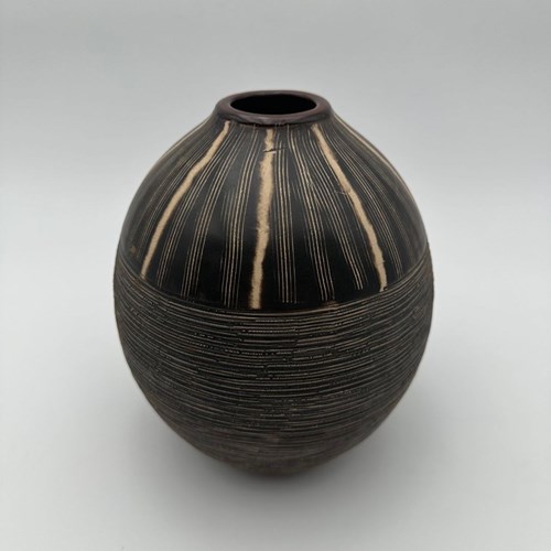 Black And White Ceramic Vase Featuring A Stylized Monogram Decoration Rendered I