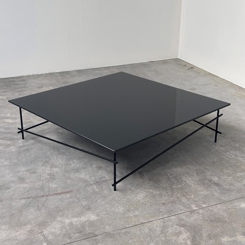 Minimalist Black Glass Coffee Table With Industrial Metal Base