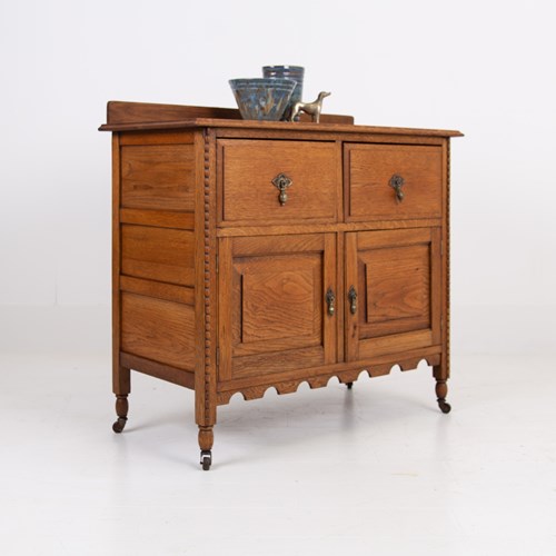 Charming Oak Cabinet With Drawers C1910