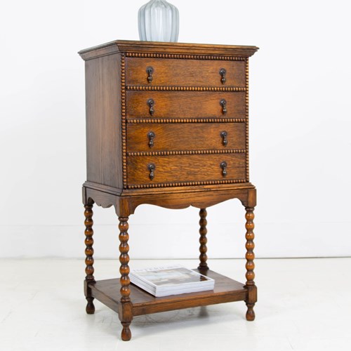 English Oak 4 Drawer Cabinet On Bobbin Legs C.1920