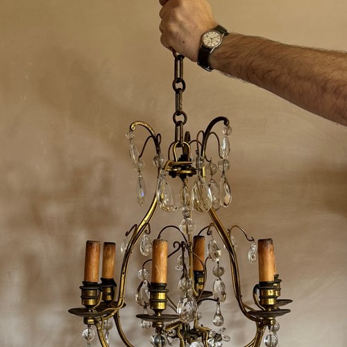 French Gilded Iron And Glass Chandelier Attributed To Bagues