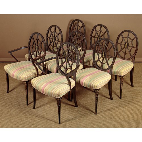 Set Of 8 Ebonised And Painted Spider Back Dining Chairs 