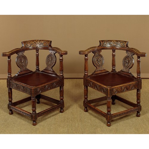 Pair Of Carved Oak Corner Chairs C.1890