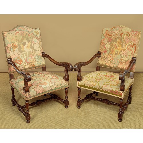 Pair Of Large Carved Walnut Armchairs C.1930