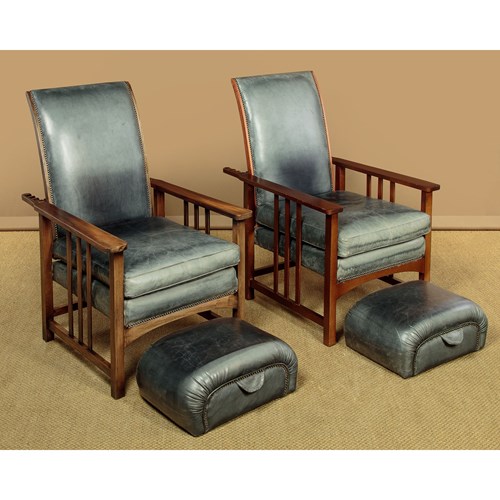 Pair Of Reclining Leather Armchairs With Footstools