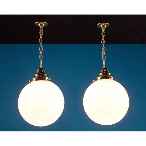 Pair Of Milk Glass Globe Pendant Lights