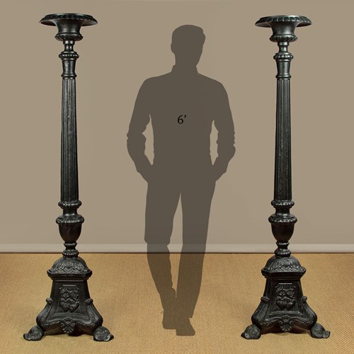 Pair Of Six Foot Tall Cast Iron Candelabra