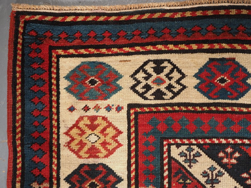 Antique Caucasian Gendje Kazak Runner -cotswold-oriental-rugs-p2230038-main-637745542177374896.JPG