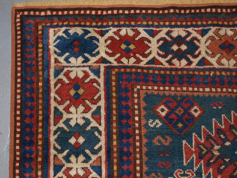 Antique Caucasian Karachov Kazak Rug on Green Grou-cotswold-oriental-rugs-pa077751-main-637788123936209549.JPG